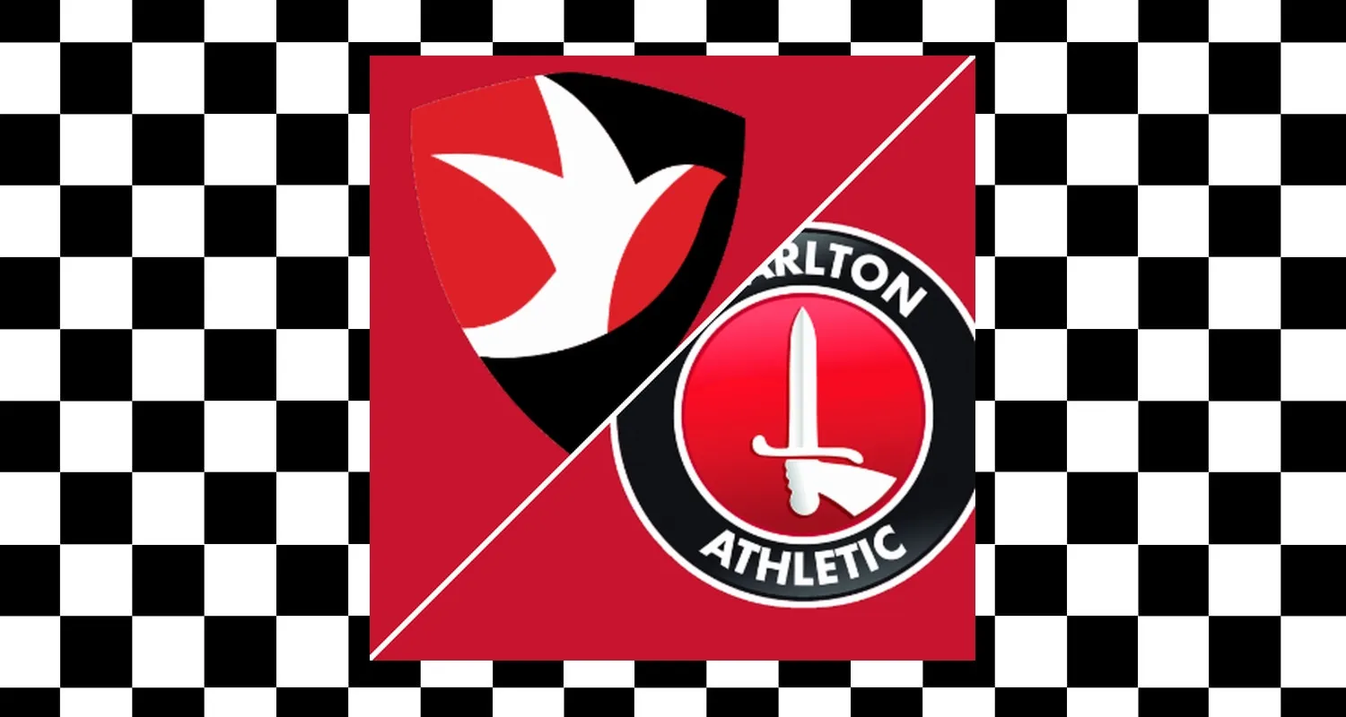 Cheltenham Town players warming up on the pitch before the Carabao Cup match against Charlton Athletic.