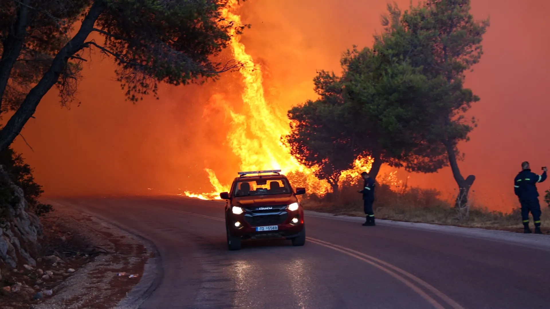 European wildfire burning through forest with smoke and flames
